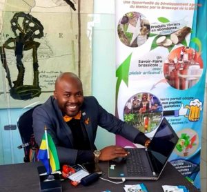 2019 Fellow Arnaud Bengono Mezui of Gabon exhibits his company's products during Africa Investor Week.
