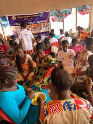 A group of people engaged in handicrafts